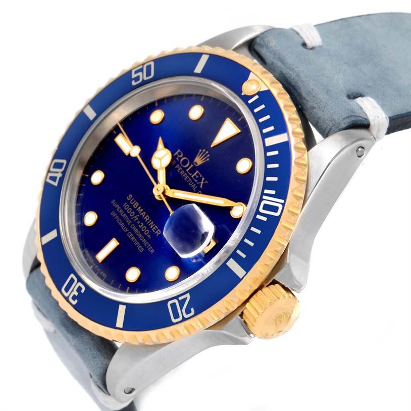 The image shows a Rolex Submariner 16613 Men's Steel and Gold (two tone) Blue Dial 16613 Men's Steel and Gold (two tone) Blue Dial watch from a slightly angled side view, highlighting the dial, bezel, and crown.
