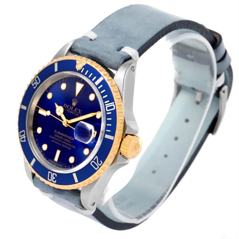 The Rolex Submariner 16613 Men's Steel and Gold (two tone) Blue Dial 16613 Men's Steel and Gold (two tone) Blue Dial watch is shown at a three-quarter angle, featuring the blue dial, bezel, and crown.