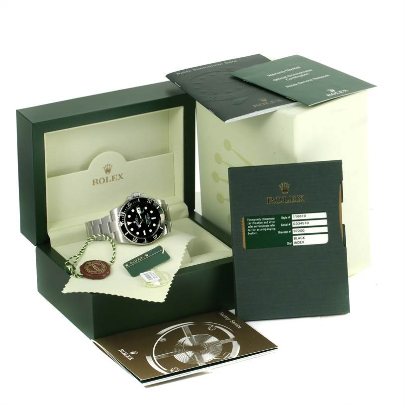 The Rolex Submariner 116610 Men
s Stainless Steel Black Dial 116610 Men
s Stainless Steel Black Dial watch is shown at a slight left angle, accompanied by its box, tags, and documentation.