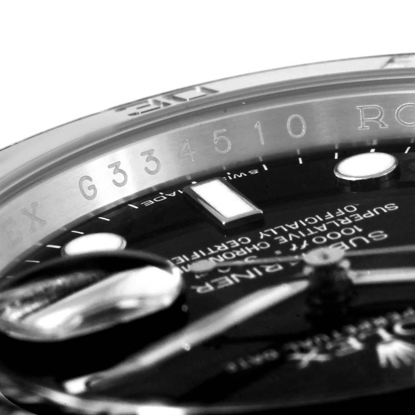 This close-up angle shows the dial and part of the bezel of the Rolex Submariner 116610 Men
s Stainless Steel Black Dial 116610 Men
s Stainless Steel Black Dial watch, highlighting the details and engravings.
