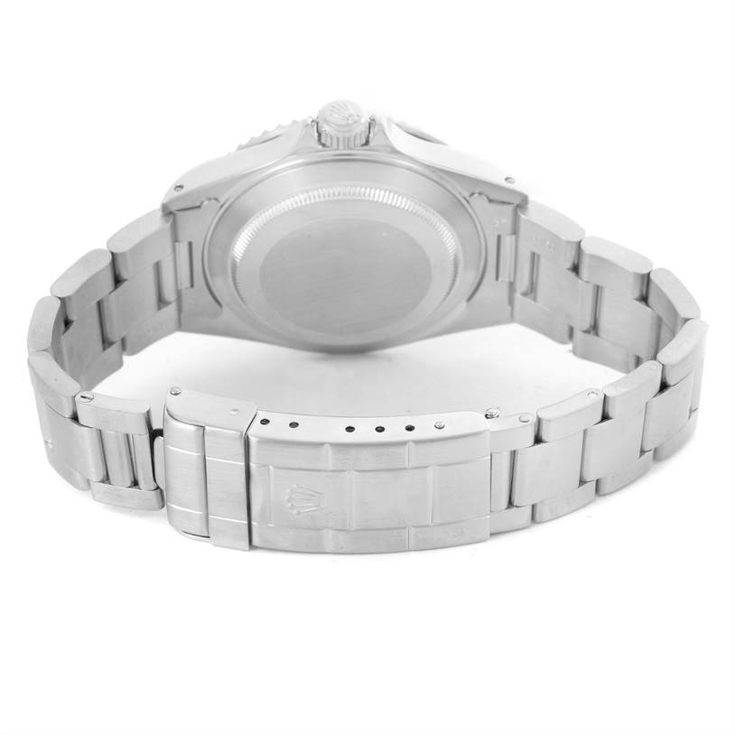 The image shows the back and bracelet of a Rolex Submariner 14060 Men
s Stainless Steel Black Dial 14060 Men
s Stainless Steel Black Dial watch, highlighting the clasp and case back.