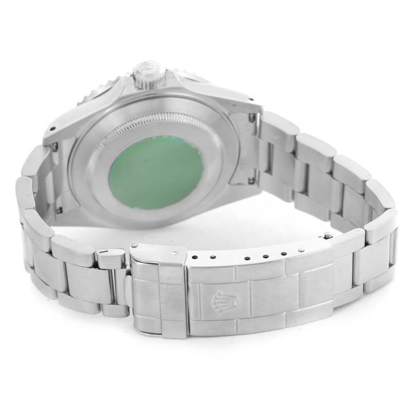 The image shows the back case and bracelet of a Rolex Submariner 16610 Men
s Stainless Steel Black Dial 16610 Men
s Stainless Steel Black Dial watch from a low-angle rear view.