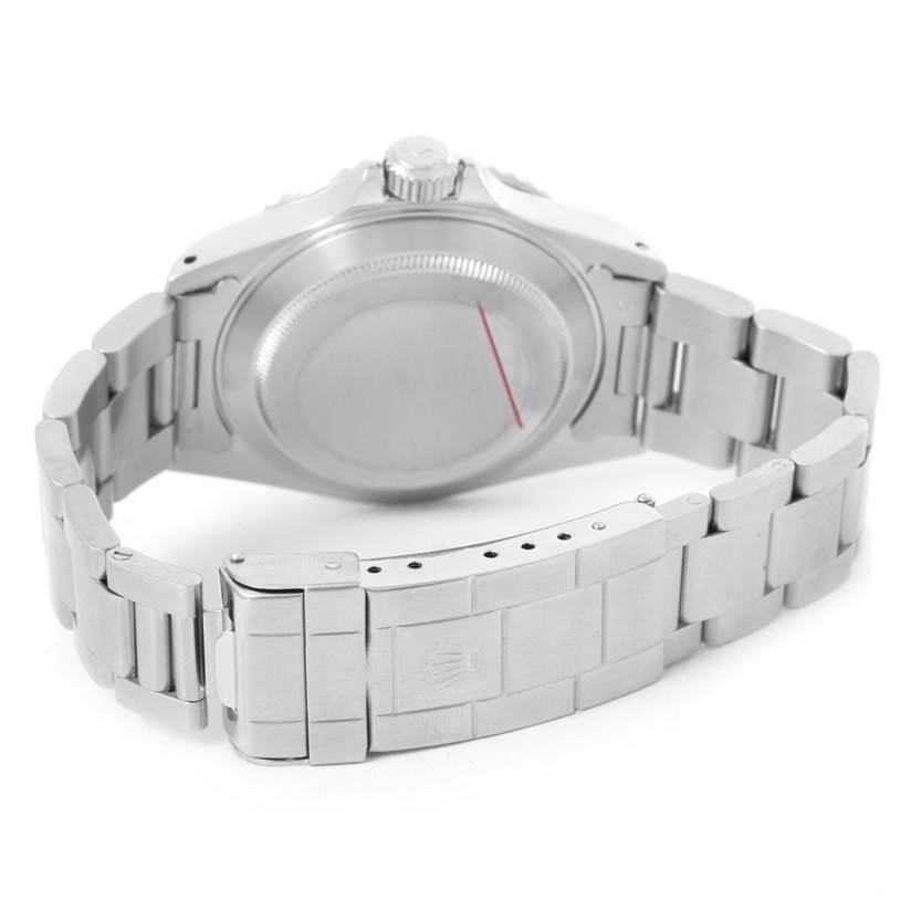 This image shows the back case and bracelet of a Rolex Submariner 14060 Men
s Stainless Steel Black Dial 14060 Men
s Stainless Steel Black Dial watch from an angled rear view.