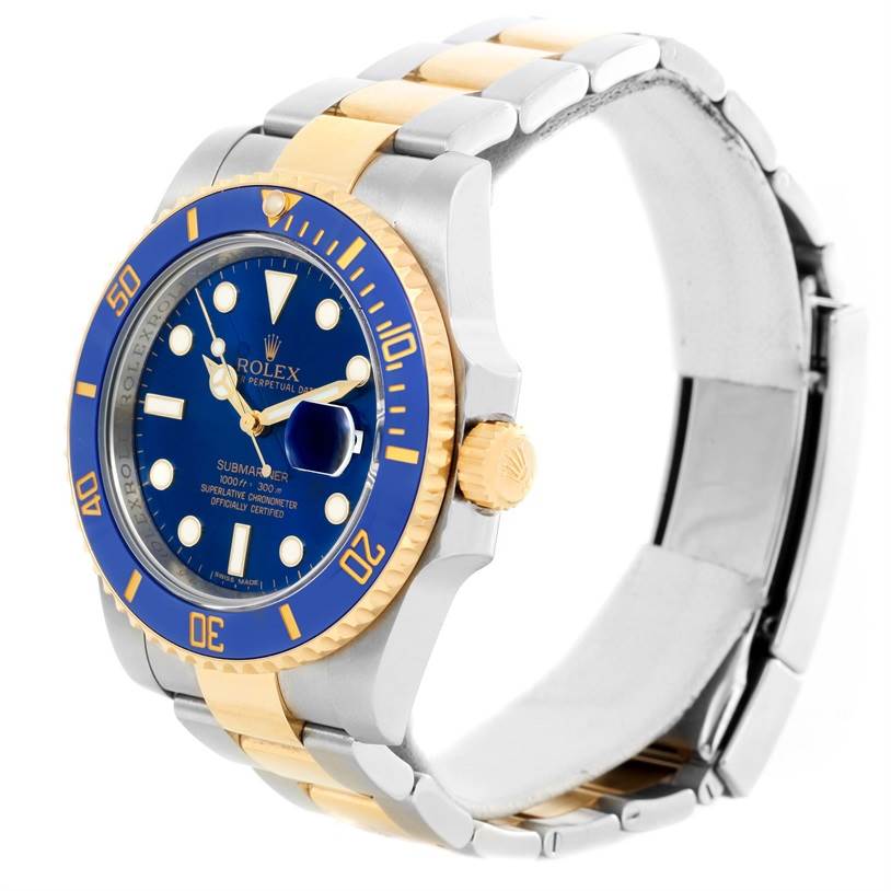 The image shows a Rolex Submariner 116613 Men's Steel and Gold (two tone) Blue Dial 116613 Men's Steel and Gold (two tone) Blue Dial watch at an angled side view, highlighting the blue dial, bezel, and two-tone bracelet.