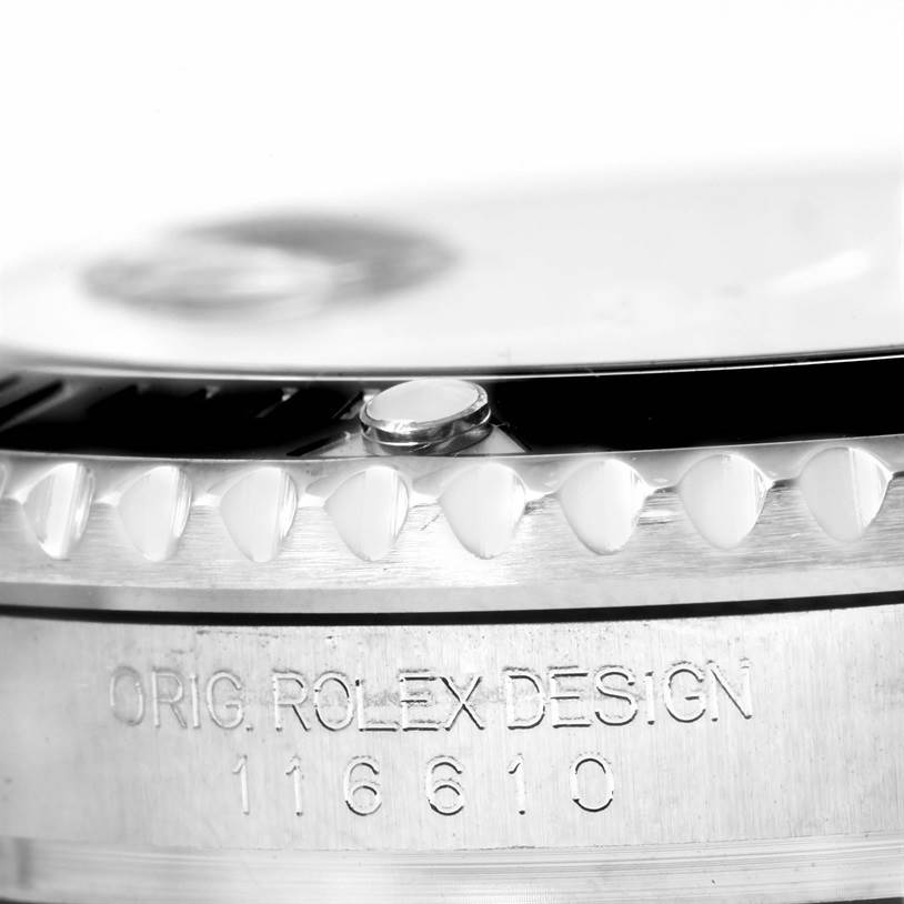 The image shows a close-up of the bezel and case side of the Rolex Submariner 116610 Men
s Stainless Steel Black Dial 116610 Men
s Stainless Steel Black Dial, displaying the model number and "ORIG. ROLEX DESIGN" engraving.