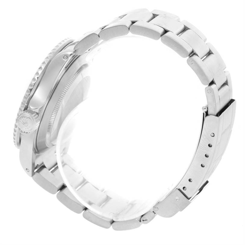 The image shows a side angle of a Rolex Submariner 16610 Men
s Stainless Steel Black Dial 16610 Men
s Stainless Steel Black Dial watch, highlighting the case, bezel, crown, and bracelet.