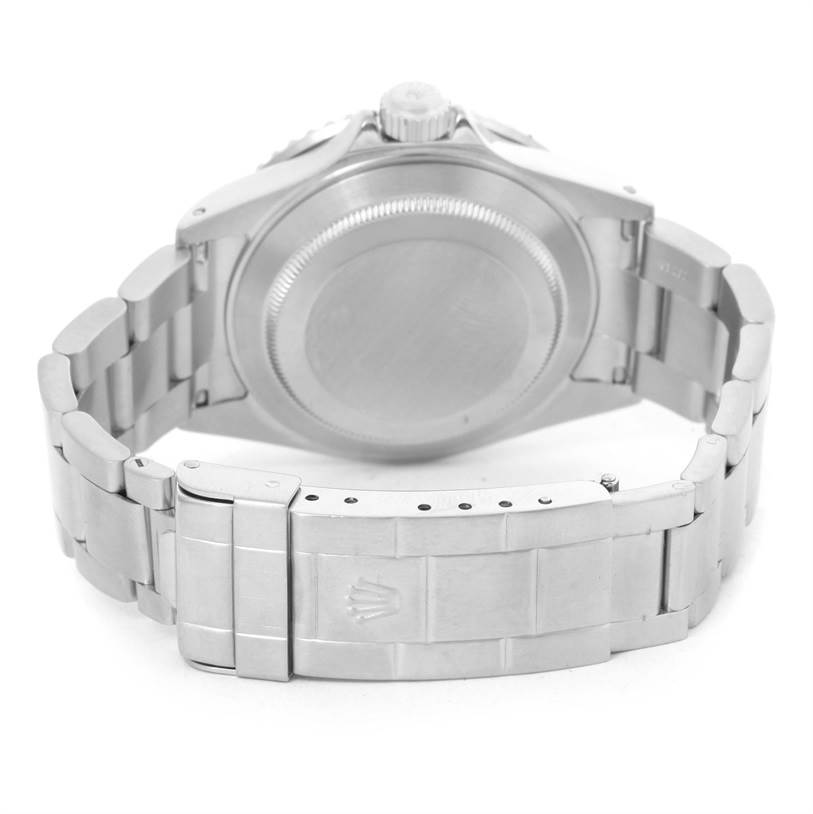 This image shows the back of a Rolex Submariner 16610 Men
s Stainless Steel Black Dial 16610 Men
s Stainless Steel Black Dial watch, focusing on the case back, bracelet, and clasp.