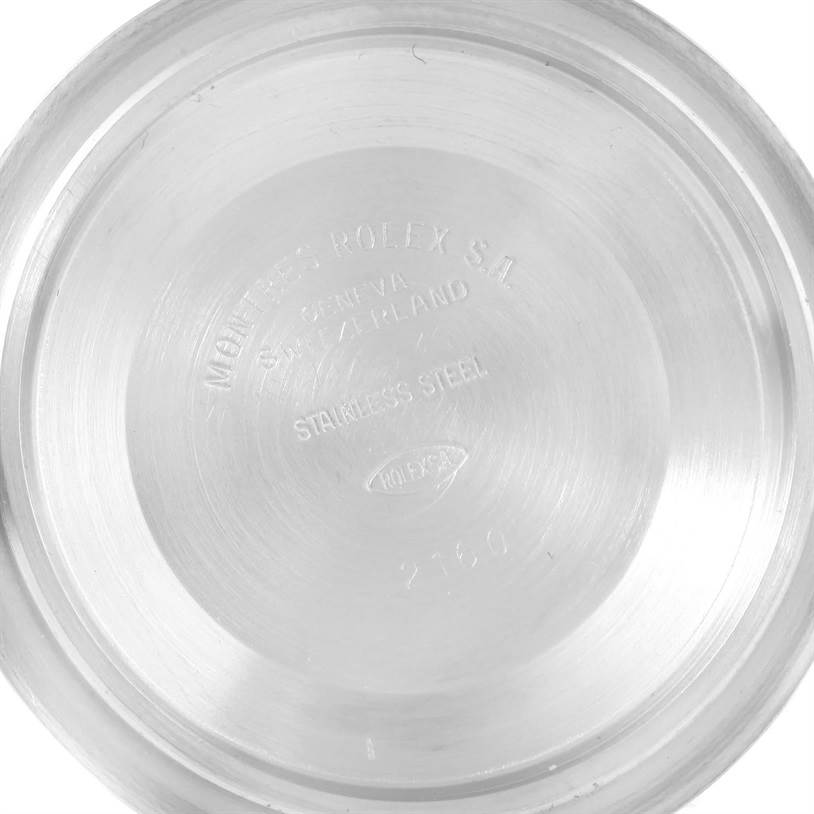 This image shows the inner case back of a Rolex Submariner 16610 Men
s Stainless Steel Black Dial 16610 Men
s Stainless Steel Black Dial watch, engraved with details about the brand and material.