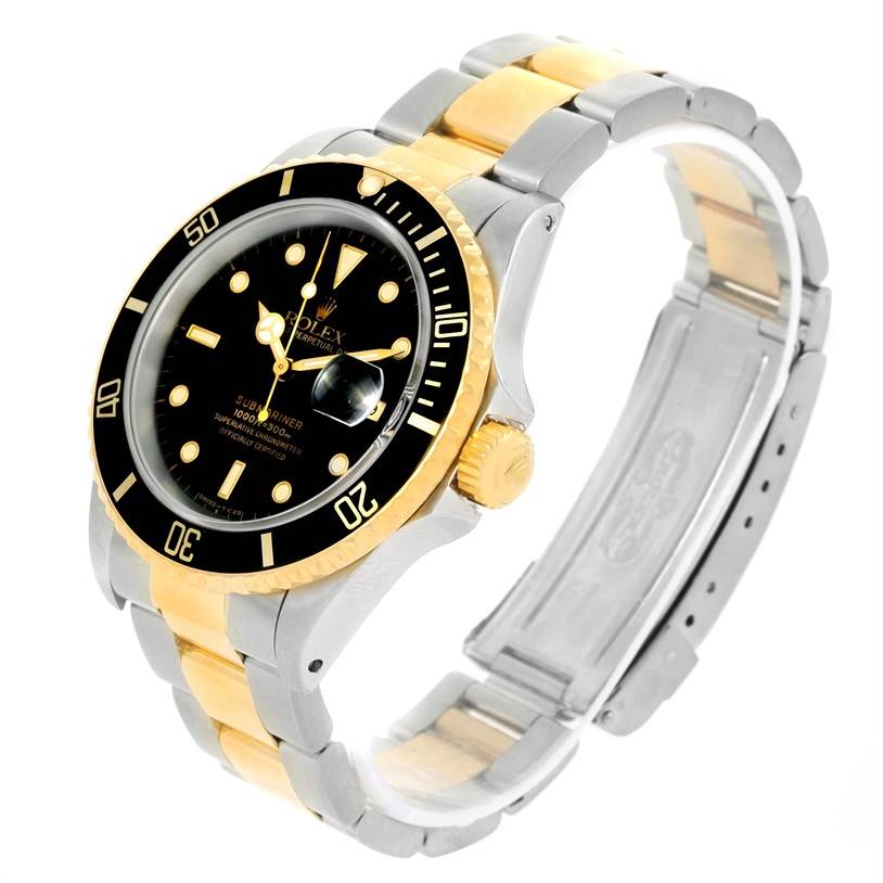 This image shows a Rolex Submariner 16613 Men's Steel and Gold (two tone) Black Dial 16613 Men's Steel and Gold (two tone) Black Dial watch at a 3/4 angle, highlighting the black dial, gold bezel, and two-tone metal bracelet.
