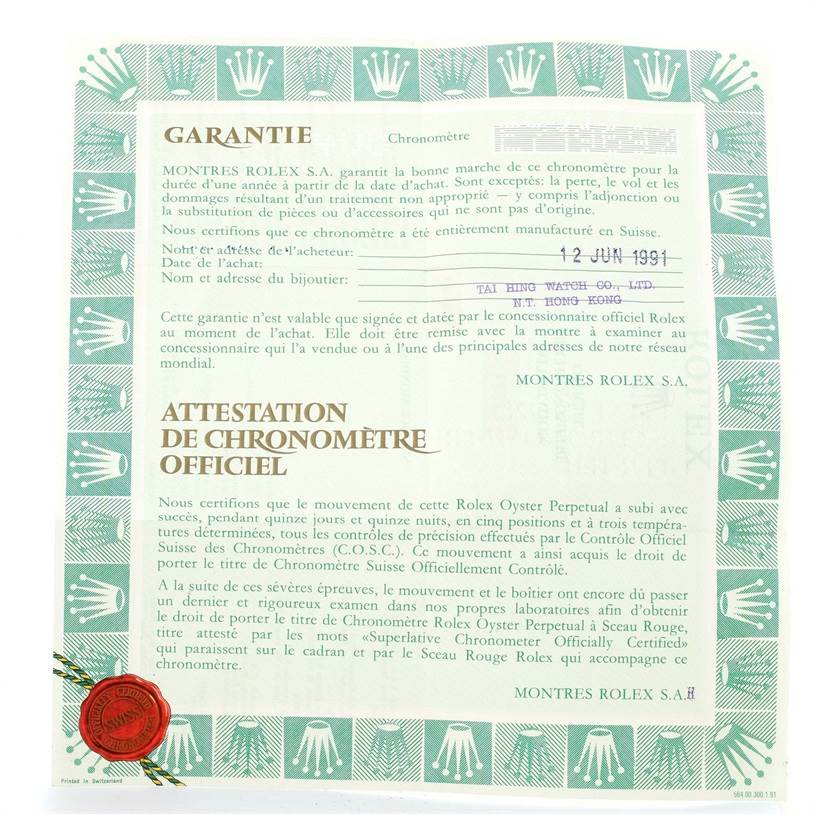 This image shows the official certification and warranty documentation for the Rolex Submariner 16613 Men's Steel and Gold (two tone) Black Dial 16613 Men's Steel and Gold (two tone) Black Dial model.