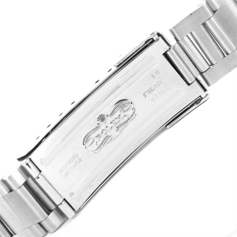 This image shows the clasp of a Rolex Submariner 16610 Men
s Stainless Steel Black Dial 16610 Men
s Stainless Steel Black Dial watch bracelet from a top-down angle, highlighting its engravings.