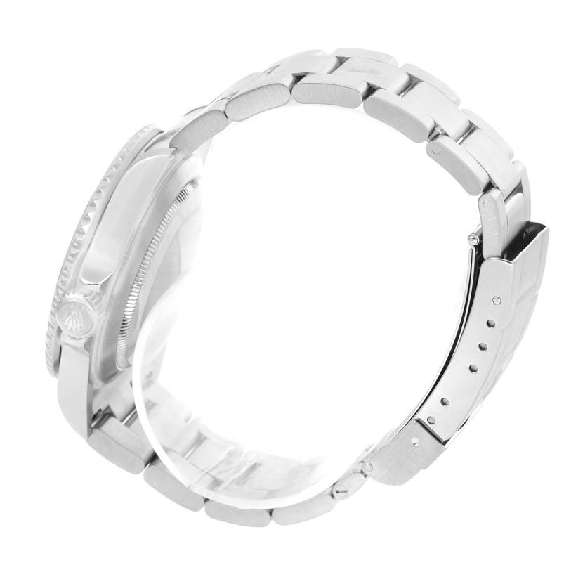 The image shows a side angle of a Rolex Submariner 16610 Men
s Stainless Steel Black Dial 16610 Men
s Stainless Steel Black Dial watch focusing on the band and crown.