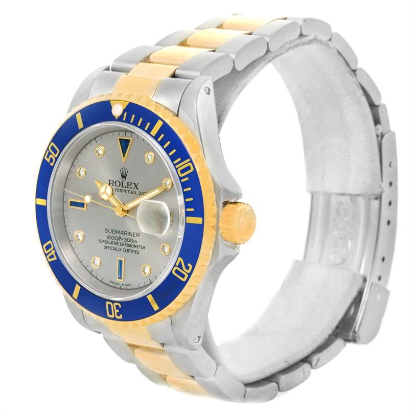 The image shows a Rolex Submariner 16613 Men's Steel and Gold (two tone) Grey Dial 16613 Men's Steel and Gold (two tone) Grey Dial watch at a three-quarter angle, highlighting the face, bezel, crown, and the bracelet.