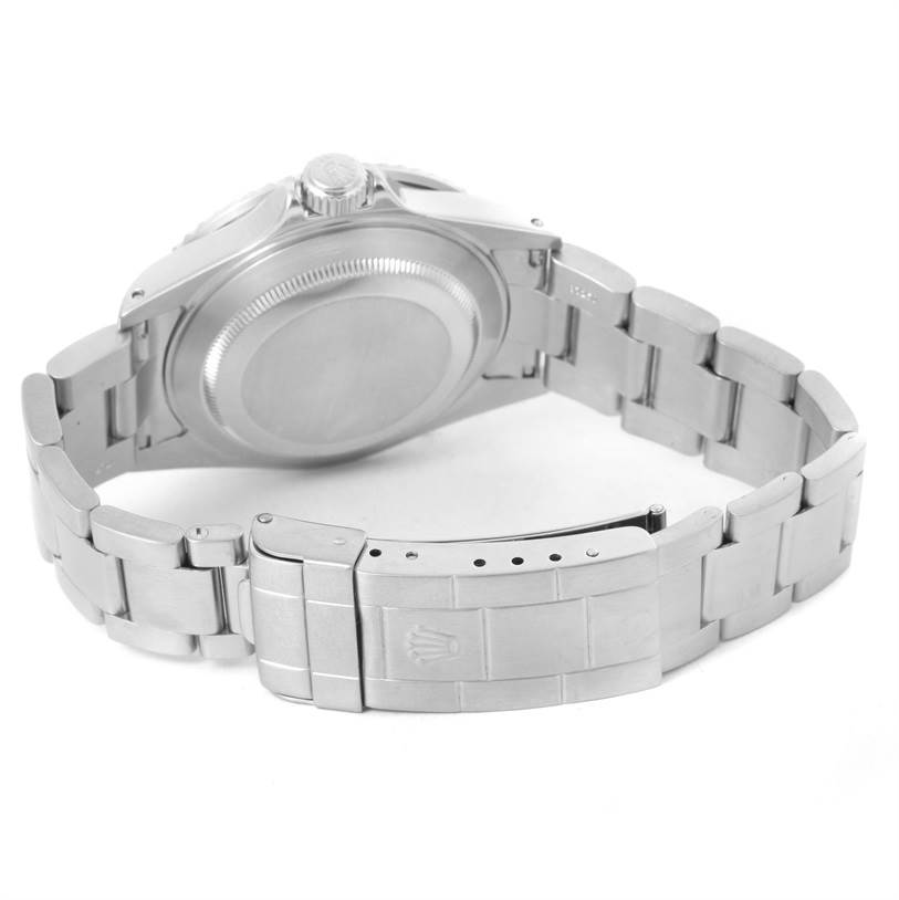 The image shows the back case and bracelet of a Rolex Submariner 16610 Men
s Stainless Steel Black Dial 16610 Men
s Stainless Steel Black Dial watch at an angled rear view, highlighting the clasp and links.