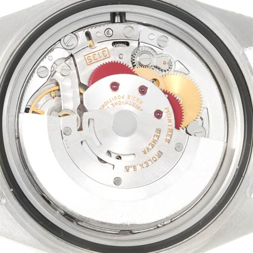 This image shows the internal mechanical movement components of a Rolex Submariner 16610 Men
s Stainless Steel Black Dial 16610 Men
s Stainless Steel Black Dial watch.