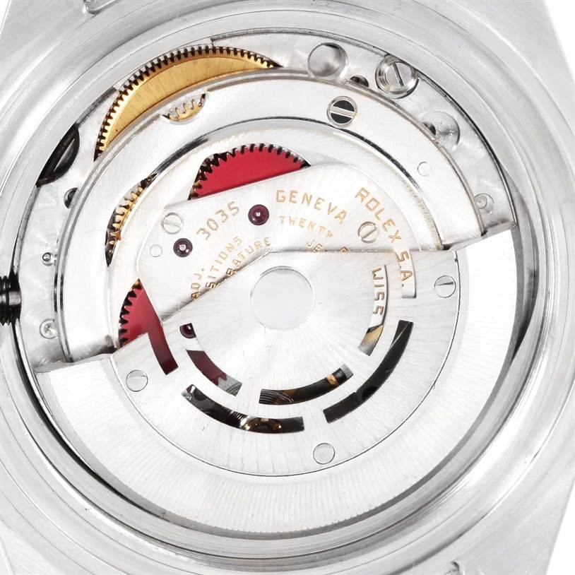 This image shows the intricate internal mechanism of a Rolex Submariner 16803 Men
s Steel and Gold (two tone) Black Dial 16803 Men
s Steel and Gold (two tone) Black Dial watch.