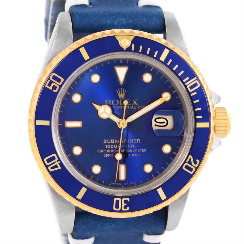 This image shows a front view of a Rolex Submariner 16803 Men
s Steel and Gold (two tone) Blue Dial 16803 Men
s Steel and Gold (two tone) Blue Dial watch, highlighting its blue dial, bezel, and date window.
