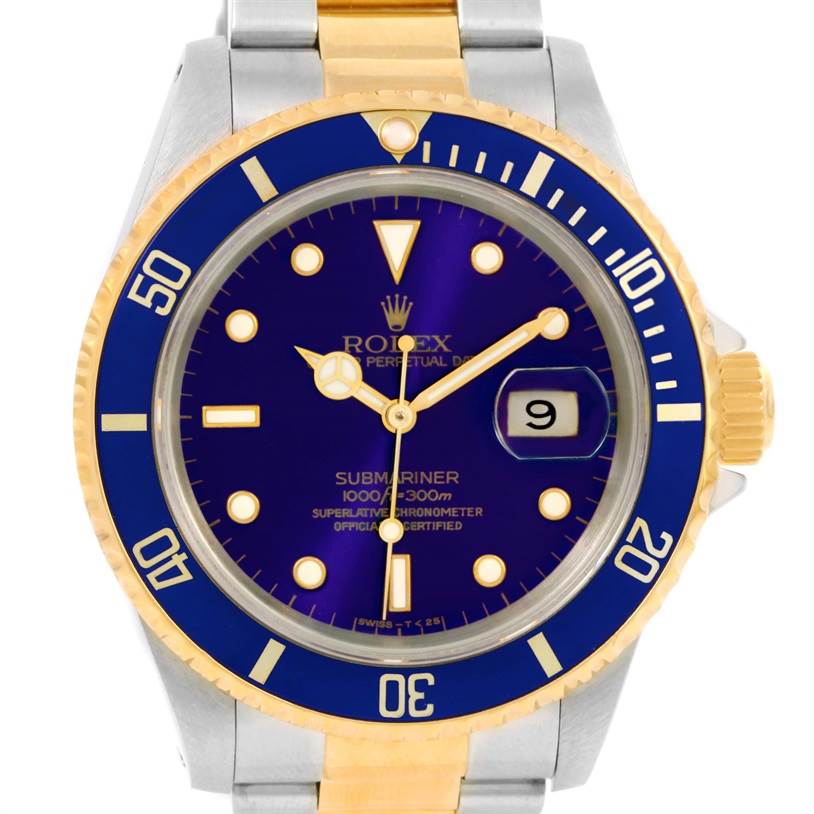 This image shows a frontal view of a Rolex Submariner 16613 Men
s Steel and Gold (two tone) Blue Dial 16613 Men
s Steel and Gold (two tone) Blue Dial watch, displaying the dial, bezel, crown, and part of the bracelet.