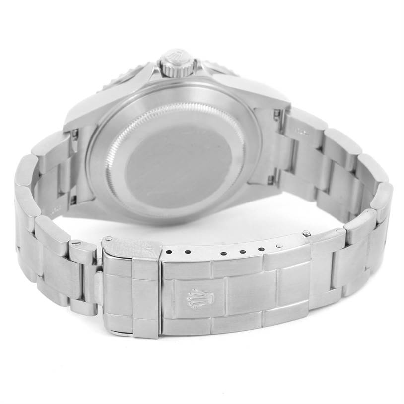 The image shows the rear view of a Rolex Submariner 16610 Men
s Stainless Steel Black Dial 16610 Men
s Stainless Steel Black Dial watch, highlighting the case back, crown, and bracelet with clasp.