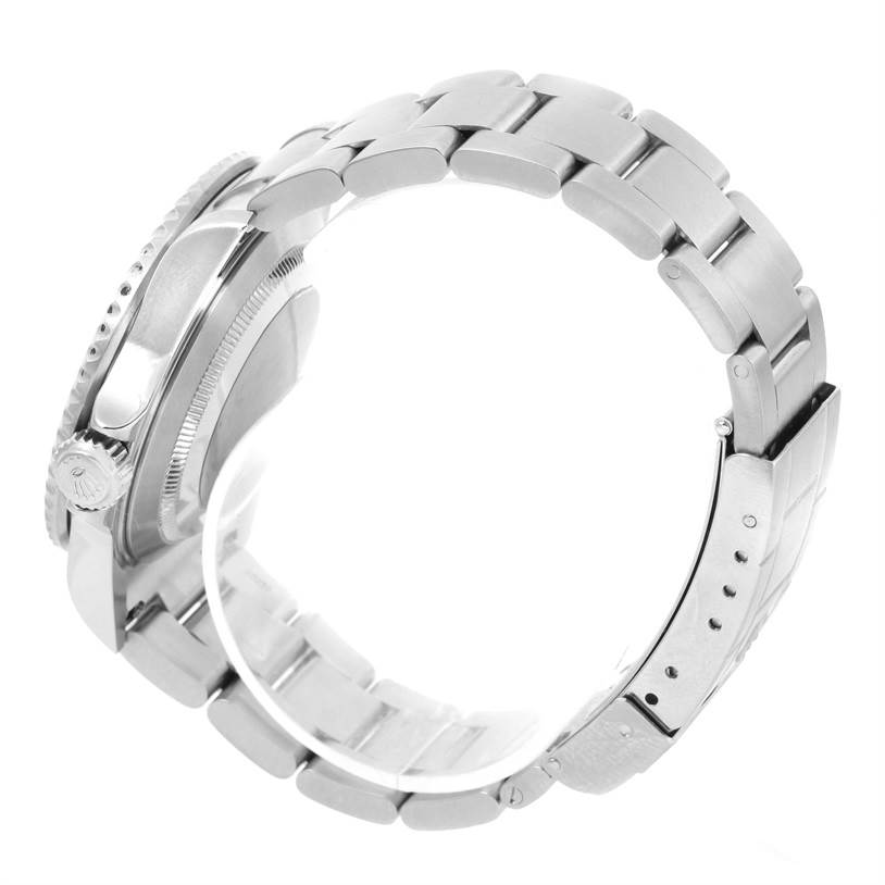 This image shows a side view of the Rolex Submariner 16610 Men
s Stainless Steel Black Dial 16610 Men
s Stainless Steel Black Dial, highlighting the watch case, crown, and bracelet with the clasp.