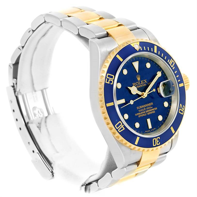 The image shows a side angle view of a Rolex Submariner 16613 Men's Steel and Gold (two tone) Blue Dial 16613 Men's Steel and Gold (two tone) Blue Dial watch, highlighting its blue dial, bezel, and two-tone bracelet.