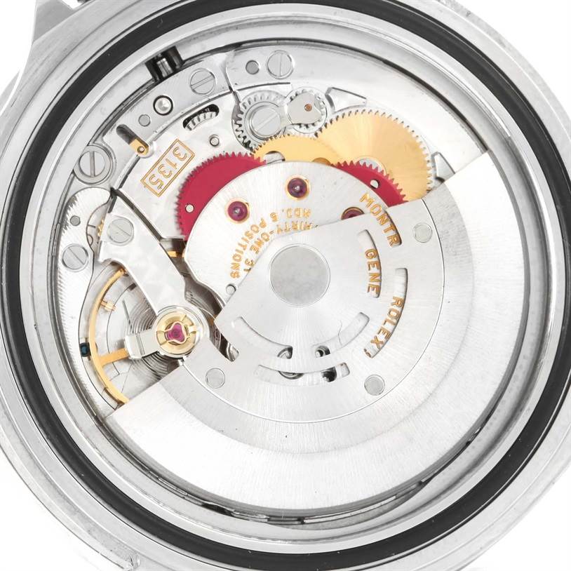 The image shows the inner mechanical components of a Rolex Submariner 16610 Men
s Stainless Steel Black Dial 16610 Men
s Stainless Steel Black Dial watch from a rear angle.