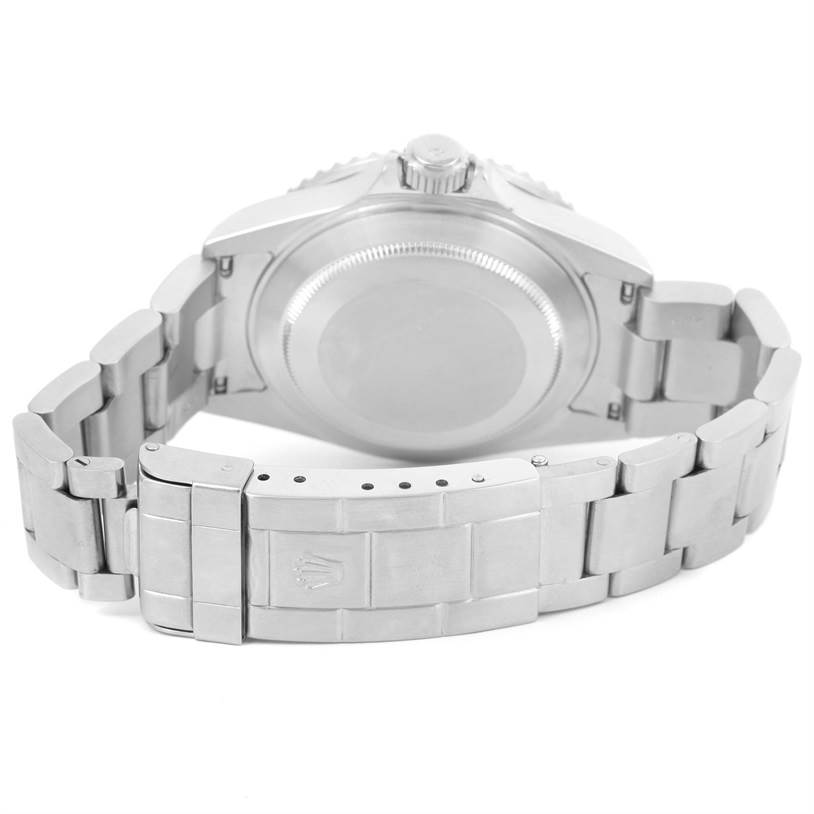 This image shows the back side and clasp of a Rolex Submariner 16610 Men
s Stainless Steel Black Dial 16610 Men
s Stainless Steel Black Dial watch, highlighting its bracelet and case back.