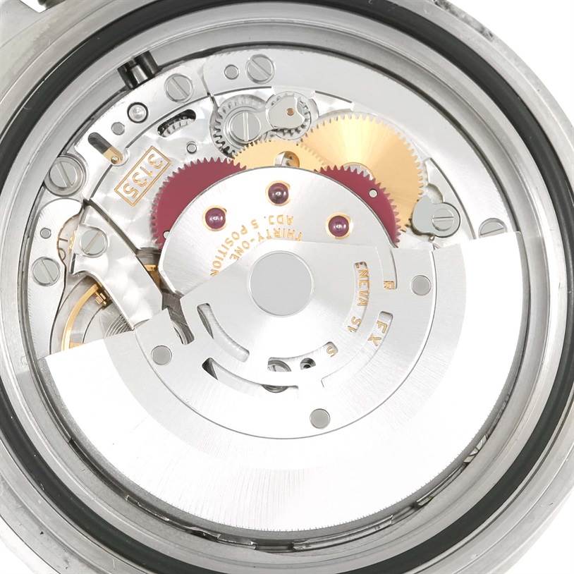 This is a close-up view of the internal mechanical movement of a Rolex Submariner 16610LV Men
s Stainless Steel Black Dial 16610LV Men
s Stainless Steel Black Dial watch.