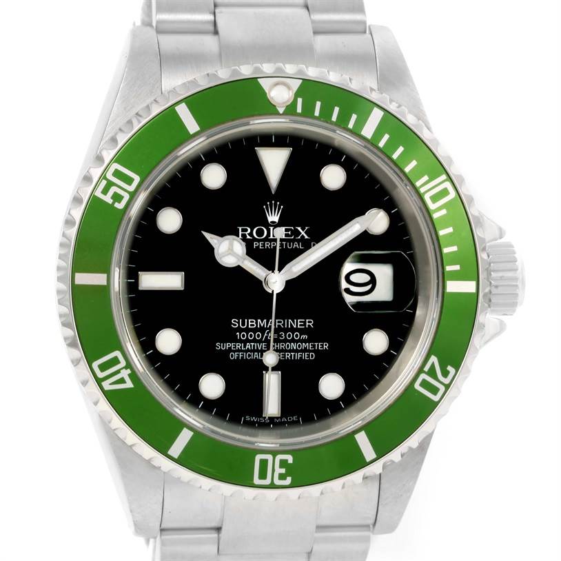 The image shows a straight-on view of a Rolex Submariner 16610LV Men
s Stainless Steel Black Dial 16610LV Men
s Stainless Steel Black Dial watch, highlighting its green bezel, black dial, and date window at 3 o
clock.
