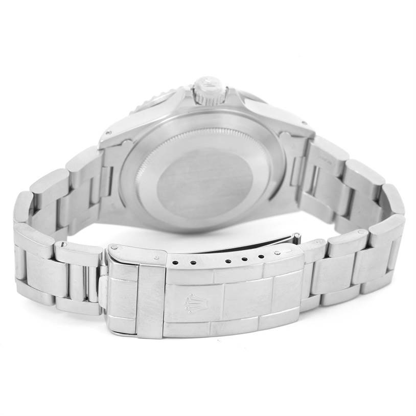 The image shows the back of a Rolex Submariner 168000 Men
s Stainless Steel Black Dial 168000 Men
s Stainless Steel Black Dial watch, including the caseback and bracelet with the clasp open.