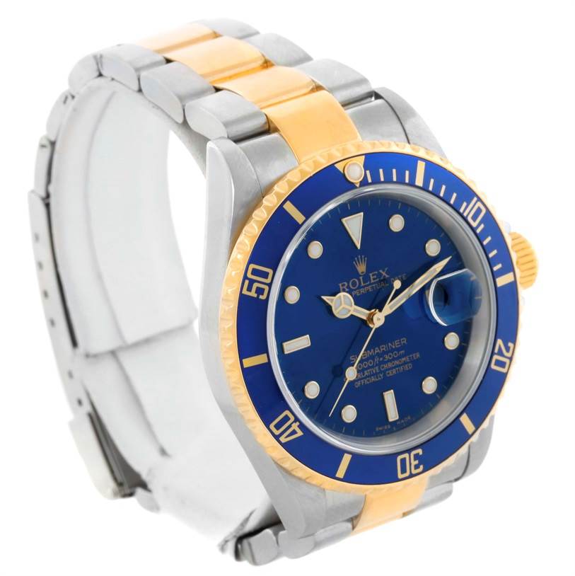 The Rolex Submariner 16613 Men
s Steel and Gold (two tone) Blue Dial 16613 Men
s Steel and Gold (two tone) Blue Dial watch is shown at an oblique angle, highlighting the blue dial, gold accents, and the bracelet.