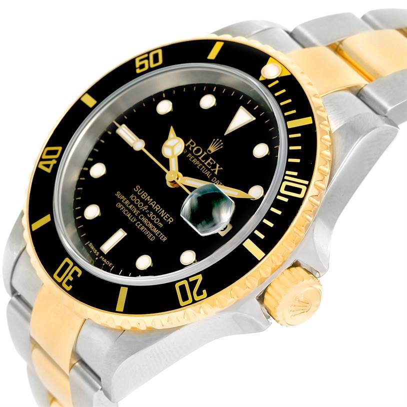 This Rolex Submariner 16613 Men's Steel and Gold (two tone) Black Dial 16613 Men's Steel and Gold (two tone) Black Dial watch is shown from a three-quarter front angle, highlighting its black dial, gold bezel, and two-tone bracelet.