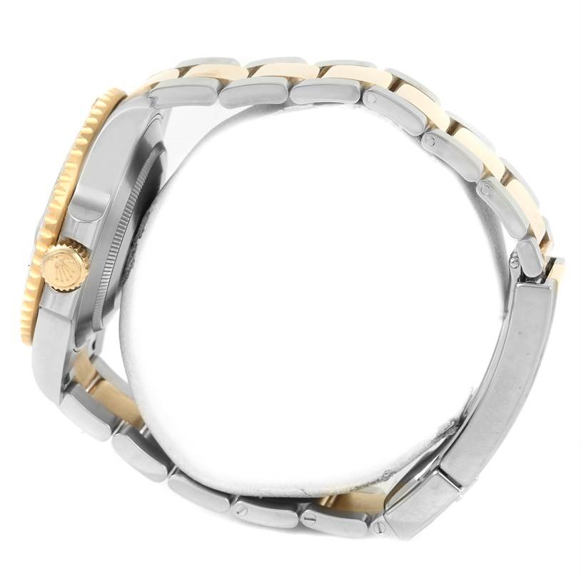 The image shows a side view of a Rolex Submariner 116613LN Men's Steel and Gold (two tone) Black Dial 116613LN Men's Steel and Gold (two tone) Black Dial watch, highlighting the crown, case, and part of the bracelet.