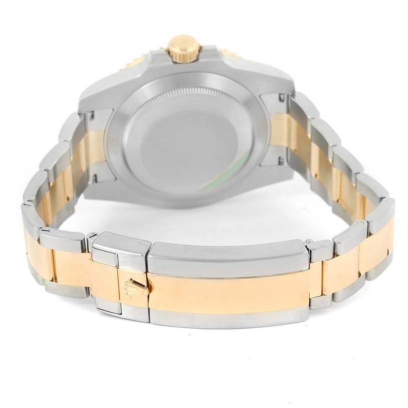 The image shows a rear view of a Rolex Submariner 116613LN Men's Steel and Gold (two tone) Black Dial 116613LN Men's Steel and Gold (two tone) Black Dial watch, highlighting the case back, bracelet, and clasp.