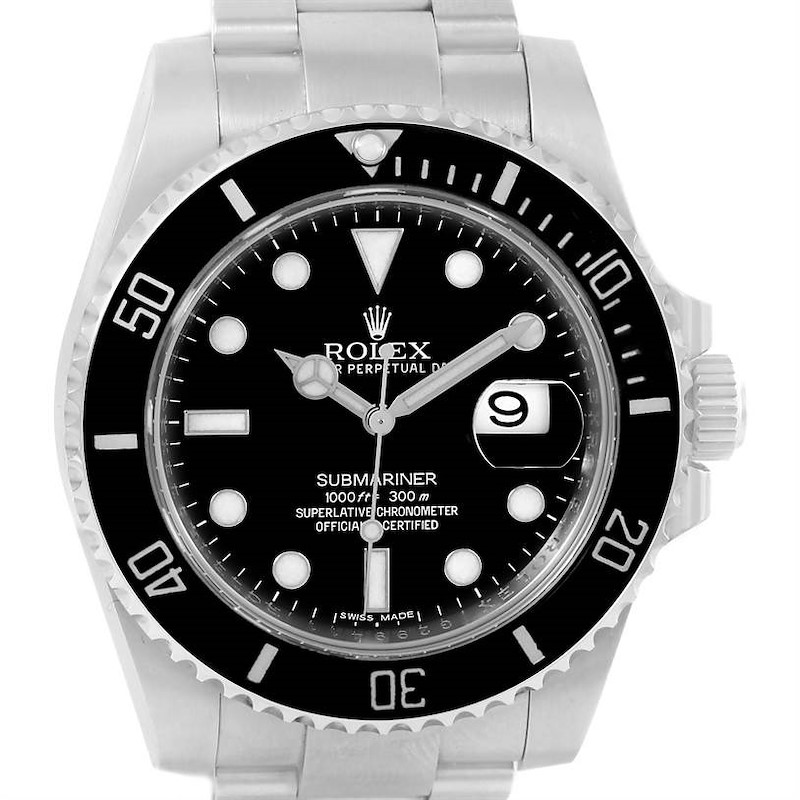 The image shows a front view of a Rolex Submariner watch, featuring its dial, bezel, and part of the bracelet.