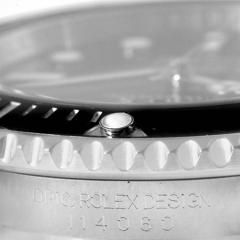 The close-up angle reveals the bezel and engraved case side of the Rolex Submariner 114060 Men
s Stainless Steel Black Dial 114060 Men
s Stainless Steel Black Dial watch.