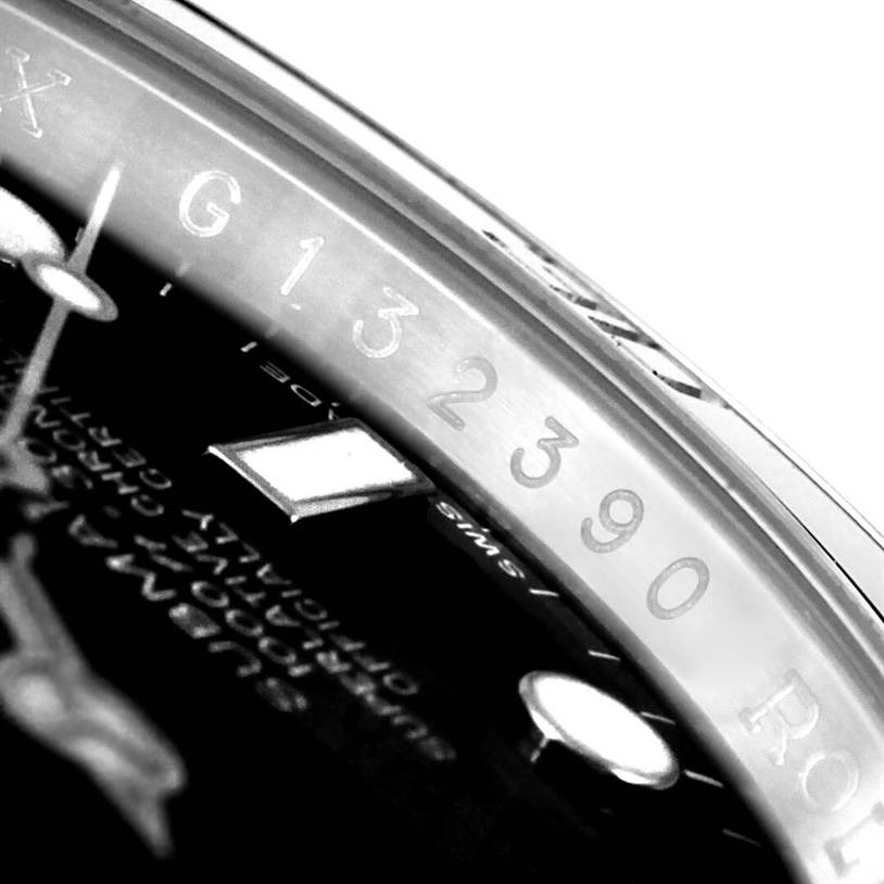 The image shows a close-up of the bezel and part of the dial of a Rolex Submariner 116610 Men
s Stainless Steel Black Dial 116610 Men
s Stainless Steel Black Dial watch.