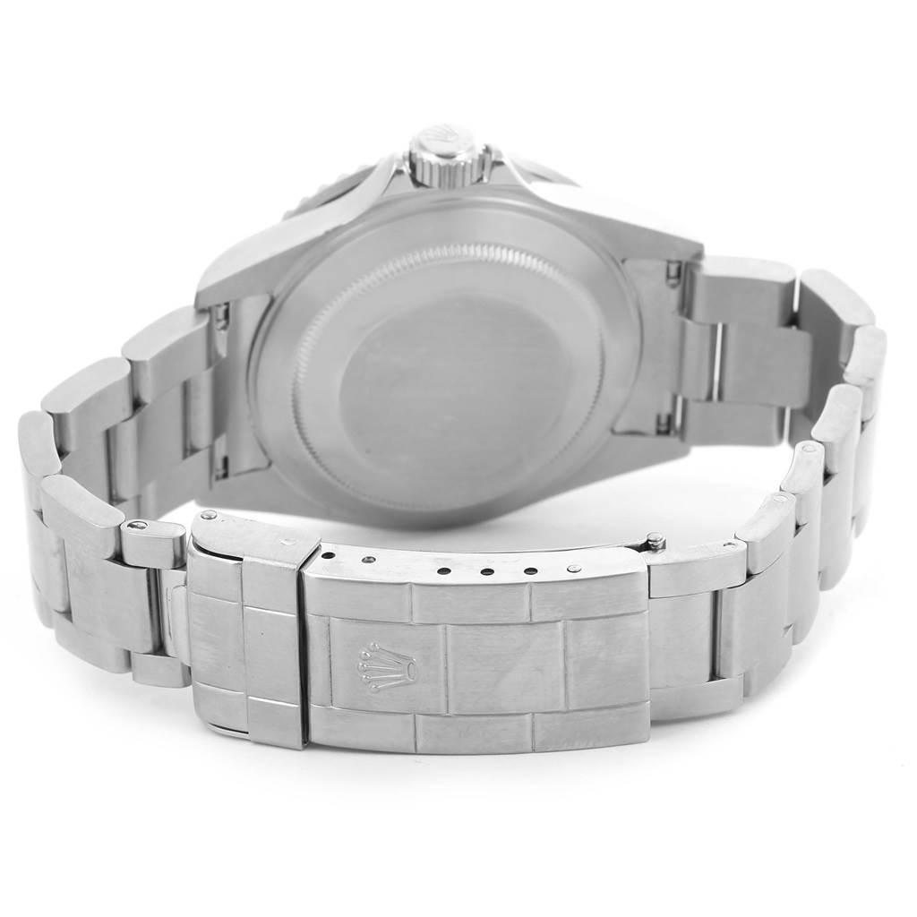 The image shows the back view of a Rolex Submariner 16610 Men
s Stainless Steel Black Dial 16610 Men
s Stainless Steel Black Dial watch, displaying the case back, crown, and bracelet clasp.