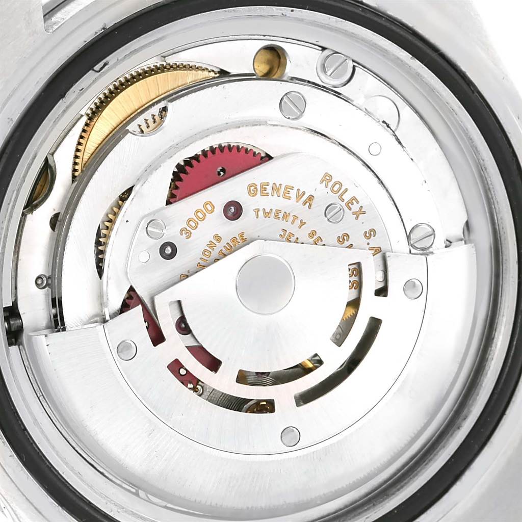 The image shows an internal, detailed view of the movement mechanism of a Rolex Submariner 14060 Men
s Stainless Steel Black Dial 14060 Men
s Stainless Steel Black Dial watch.