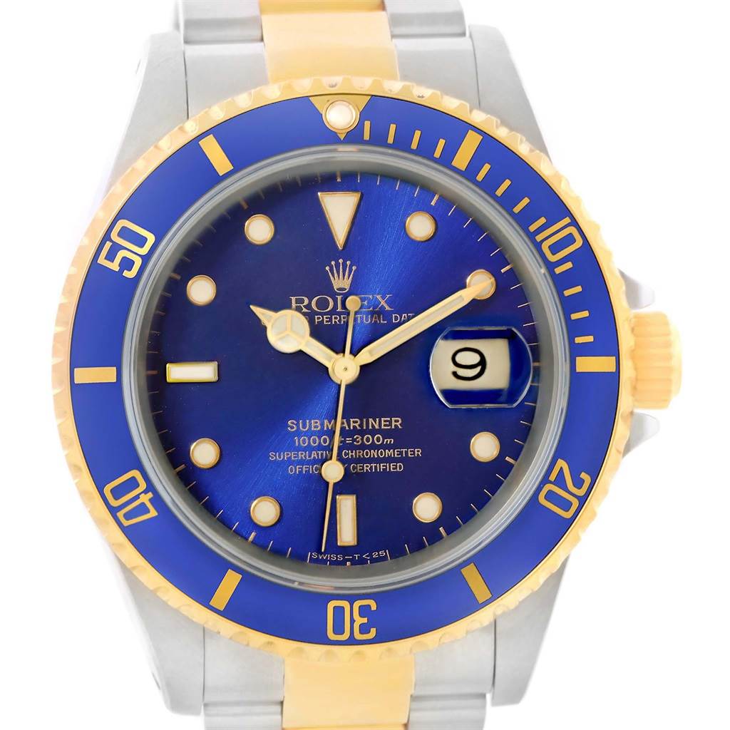 The image shows a full front view of the Rolex Submariner 16613 Men
s Steel and Gold (two tone) Blue Dial 16613 Men
s Steel and Gold (two tone) Blue Dial watch featuring a blue dial and bezel, with a two-tone metal band.