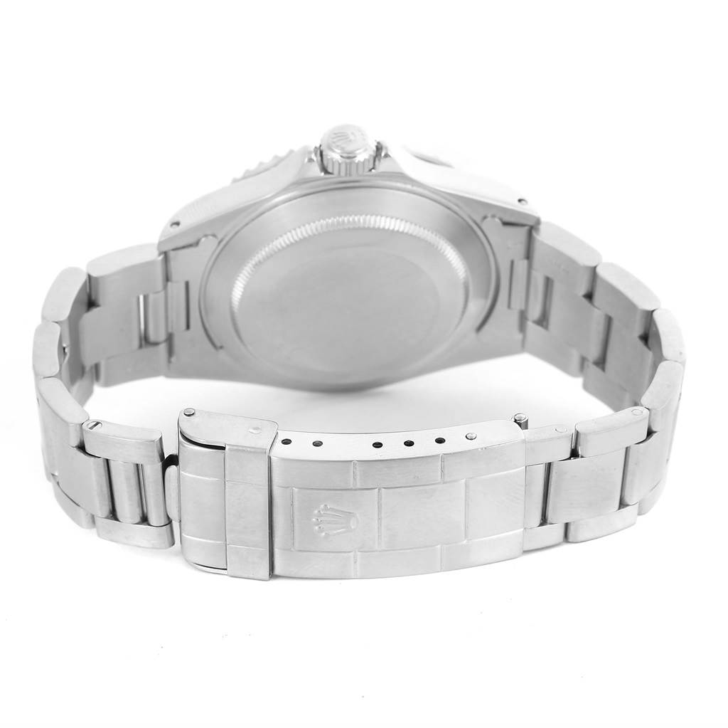 The image shows the back case and bracelet of a Rolex Submariner 16610 Men
s Stainless Steel Black Dial 16610 Men
s Stainless Steel Black Dial watch from a rear angle.