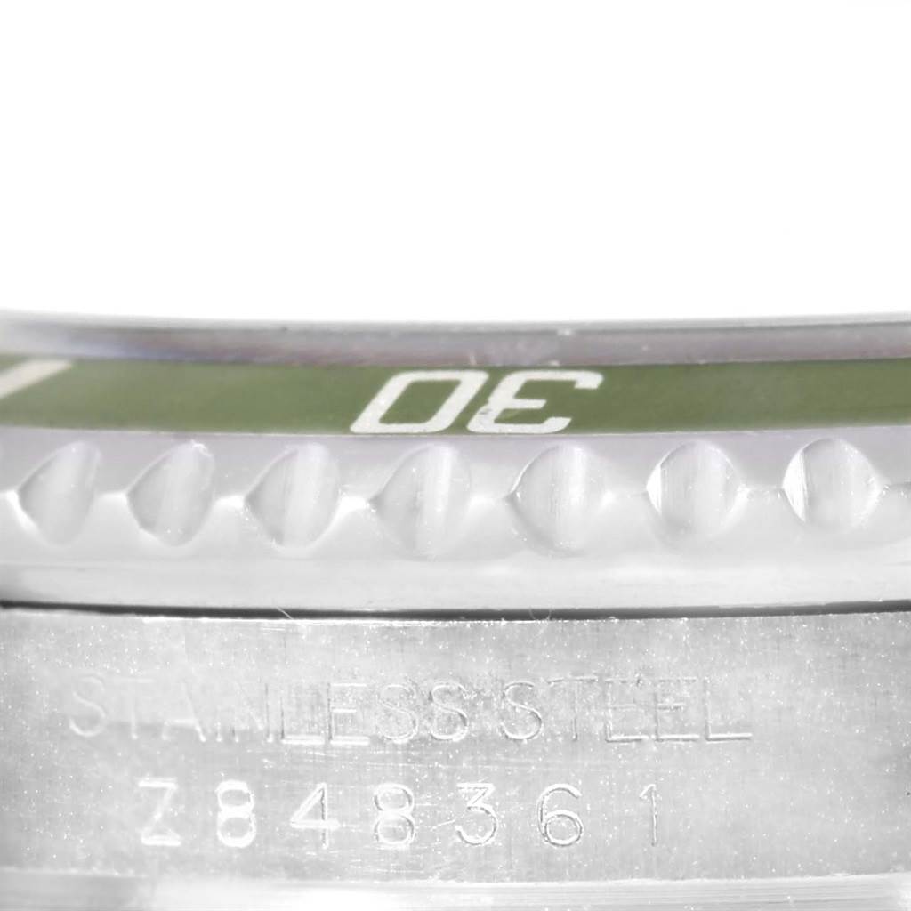 Close-up angle showing the serial number and bezel edge of a Rolex Submariner 16610LV Men
s Stainless Steel Black Dial 16610LV Men
s Stainless Steel Black Dial watch.