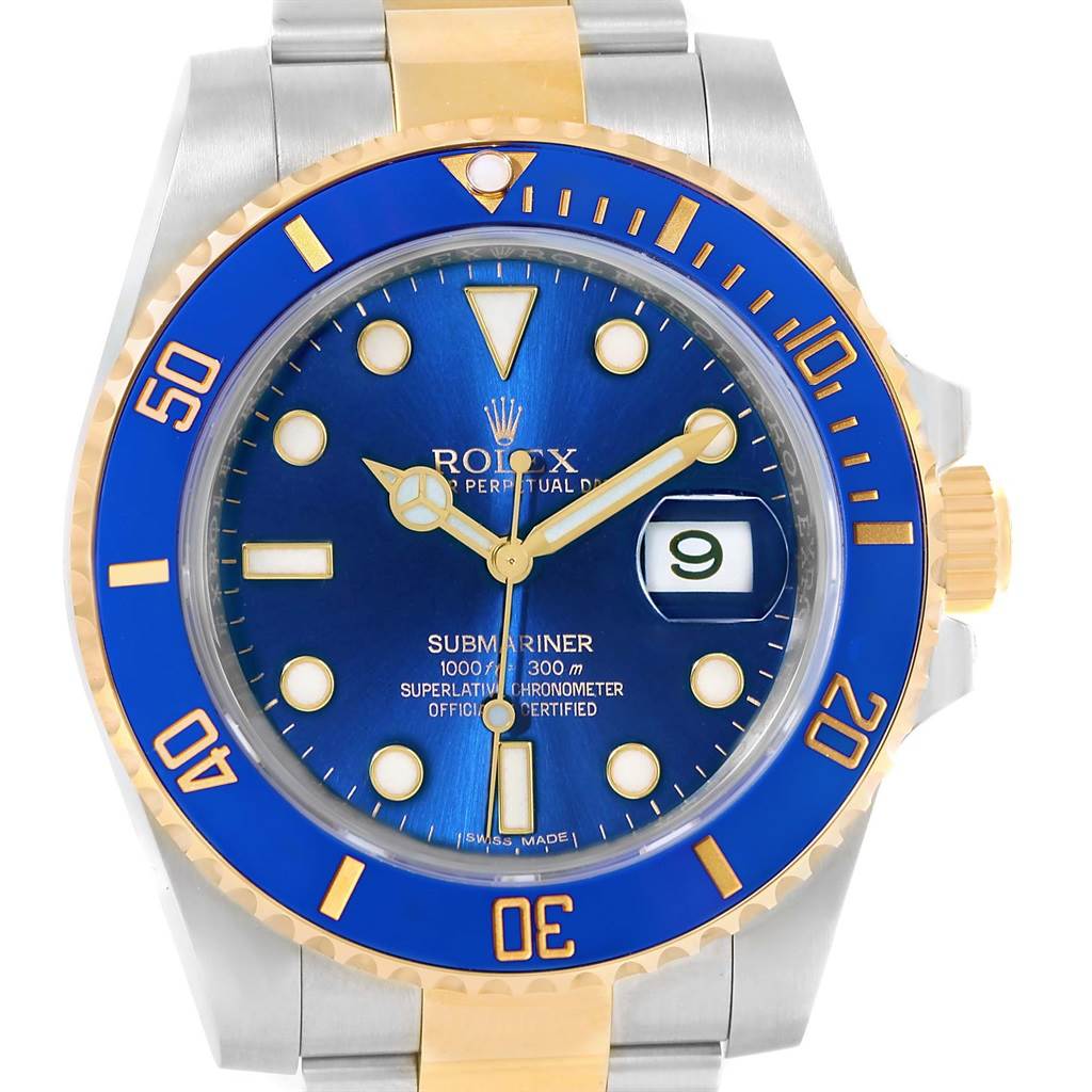 This image shows the face of a Rolex Submariner 116613 Men
s Steel and Gold (two tone) Blue Dial 116613 Men
s Steel and Gold (two tone) Blue Dial watch with a blue bezel and blue dial, viewed from the front.