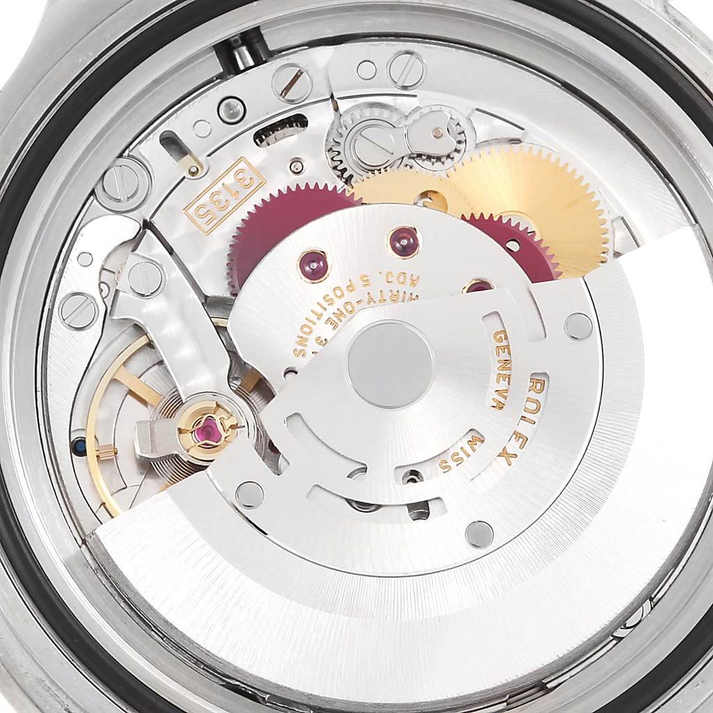 The image shows a close-up view of the movement mechanism from the back of a Rolex Submariner 16610 Men
s Stainless Steel Black Dial 16610 Men
s Stainless Steel Black Dial watch.