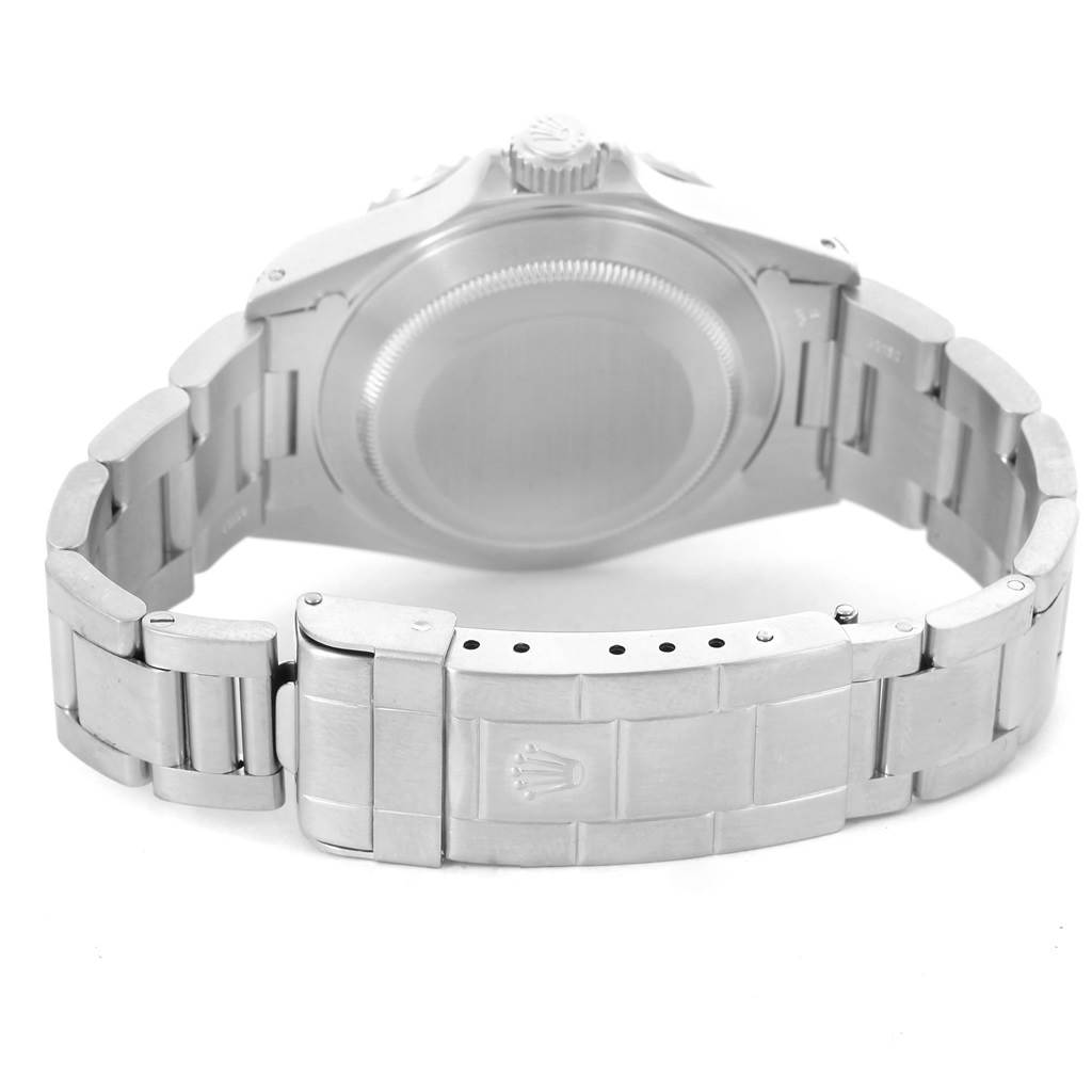 This image shows the back view of a Rolex Submariner 14060 Men
s Stainless Steel Black Dial 14060 Men
s Stainless Steel Black Dial, focusing on its case back, bracelet, and clasp.