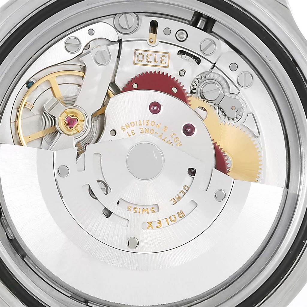 The image shows the intricate inner movement mechanism of the Rolex Submariner 14060 Men
s Stainless Steel Black Dial 14060 Men
s Stainless Steel Black Dial watch, viewed from the back.