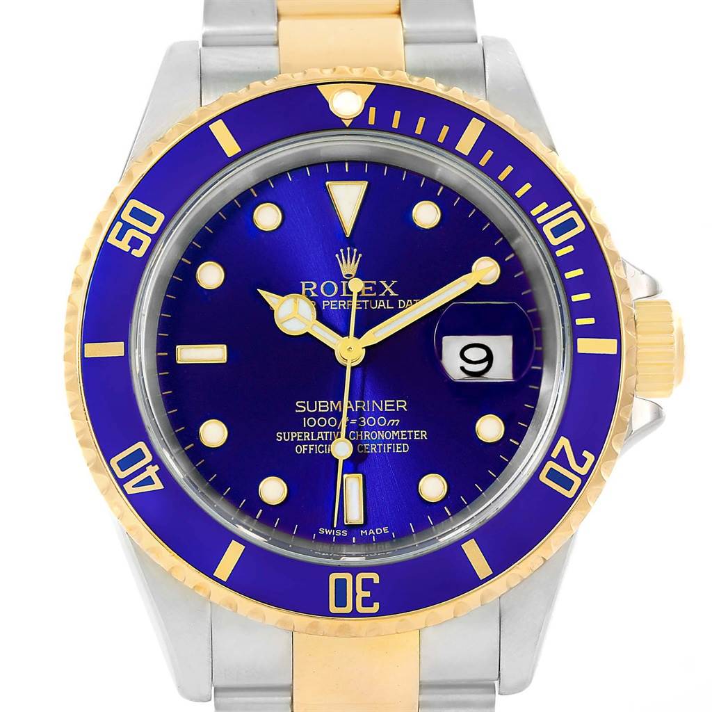 This image shows a front view of a Rolex Submariner 16613 Men
s Steel and Gold (two tone) Blue Dial 16613 Men
s Steel and Gold (two tone) Blue Dial watch with a blue and gold bezel and dial, showcasing the date window and crown.
