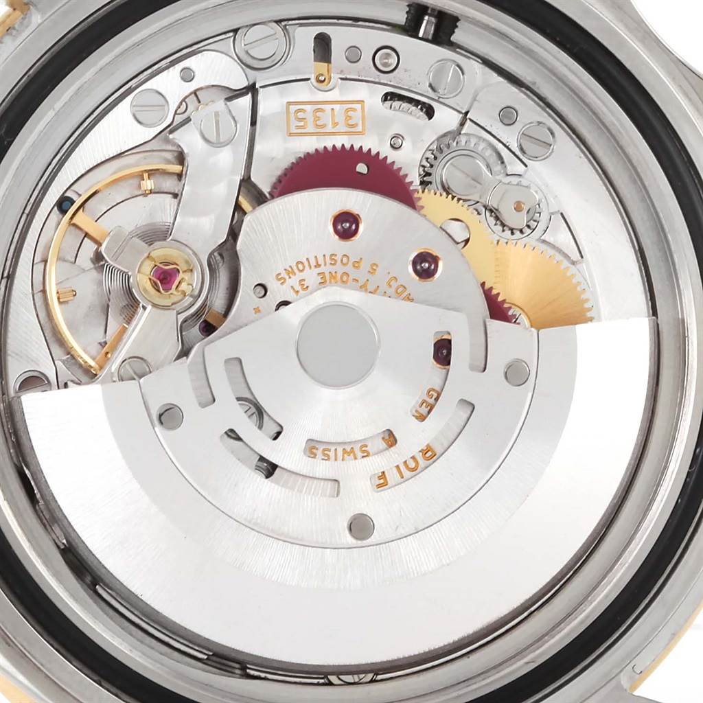 This image shows an internal view of the movement mechanism of a Rolex Submariner 16613 Men
s Steel and Gold (two tone) Blue Dial 16613 Men
s Steel and Gold (two tone) Blue Dial watch.