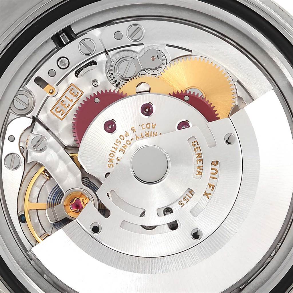 This image shows the movement mechanism of a Rolex Submariner 116622 Men
s Stainless Steel Silver Dial 116622 Men
s Stainless Steel Silver Dial watch, including gears and parts of the rotor.