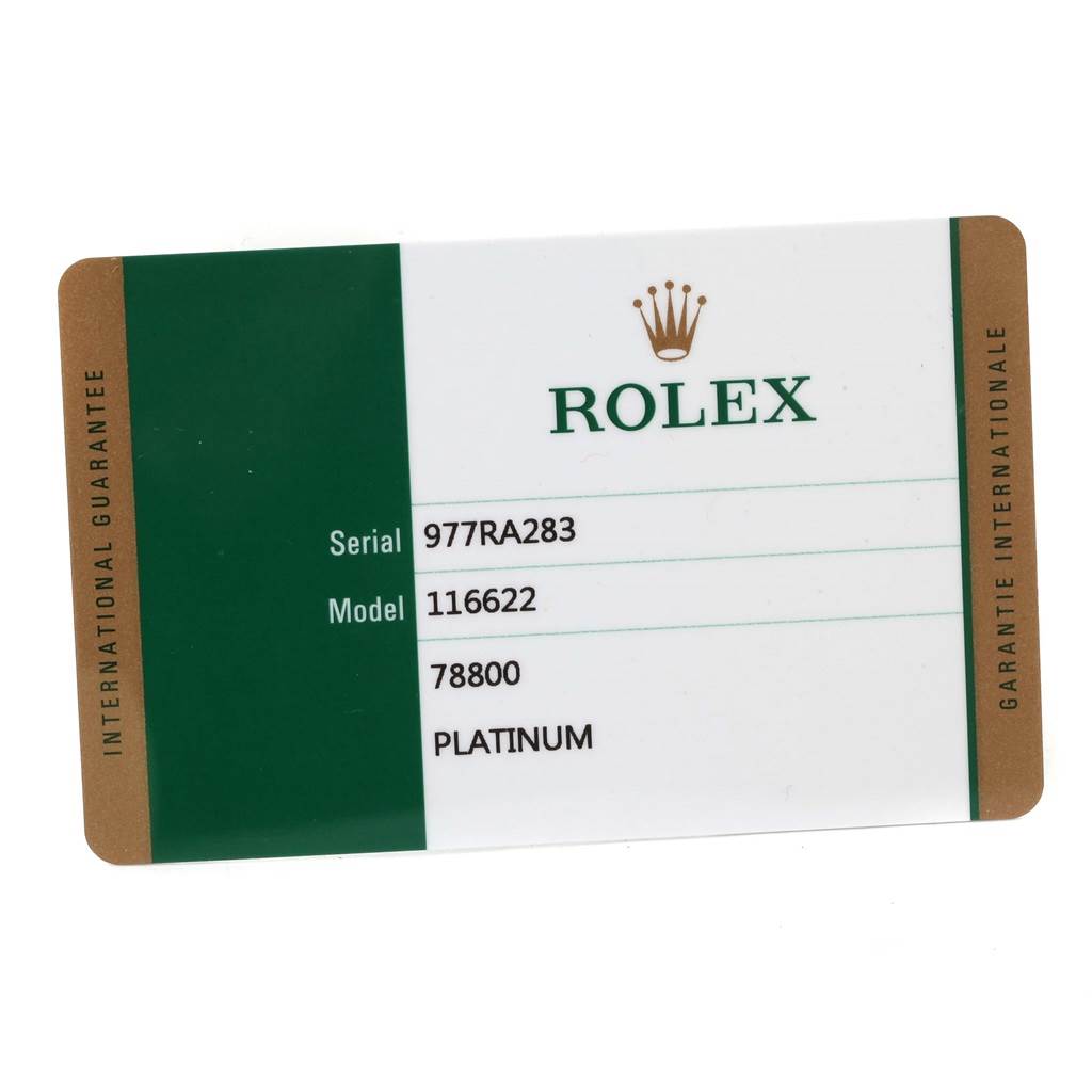 The image shows a Rolex Submariner 116622 Men
s Stainless Steel Silver Dial 116622 Men
s Stainless Steel Silver Dial model 116622 warranty card with serial number 977RA283.
